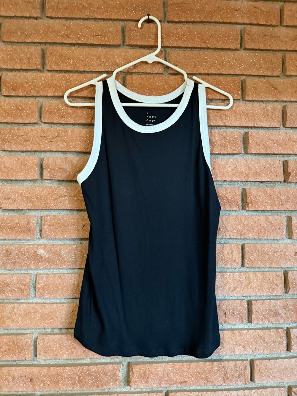 A new day tank top- black with white trim